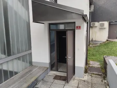 an entrance to a building with an open door at Studio Kaninska vas in Bovec