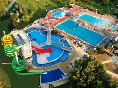 an overhead view of a water park with two pools at Studio apartment 