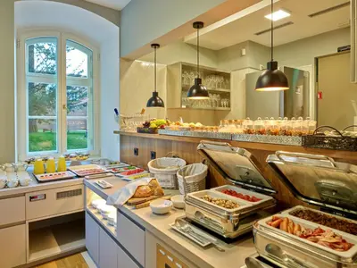 a buffet line with a lot of food at Spa Suite Dobrna - Terme Dobrna in Dobrna