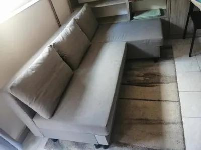 a white couch in a room with a table at Freya in Lesce