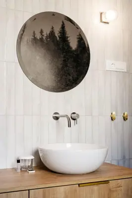 a bathroom with a sink and a mirror on the wall at Pr Kopač in Brezovica