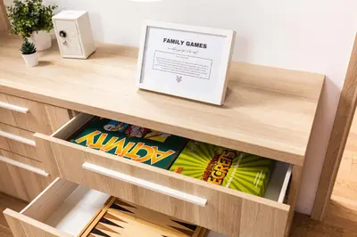 a drawer in a desk with a box of candy at Vigorous Bled Apartment in Bled