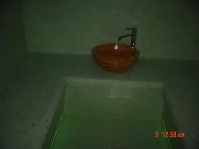 a bathroom with a wooden sink and a tub at Apartments Vrdjan in Cerknica
