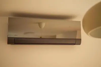 a mirror hanging on a wall with a room at Chang Thai apartments in Ljubljana