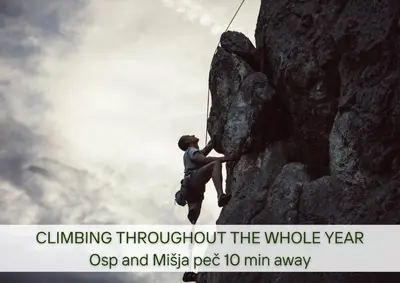 a person is climbing a rock wall at Villa Lapis in Črni Kal