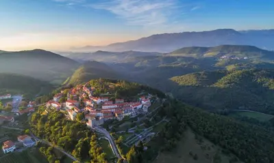 an aerial view of a town in the mountains at Cilka`s house, authentic homestay near Lipica in Sežana