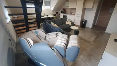 an aerial view of a living room with a couch at Apartment VAZATAOR with sauna in Brežice