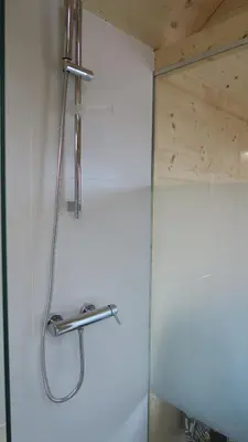 a shower in a bathroom with a glass door at Apartma, glamping Na koncu vasi in Ljutomer