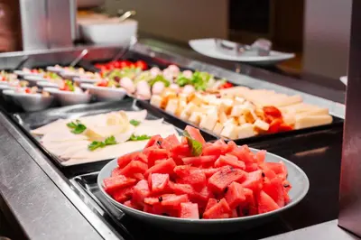 a buffet with a bunch of different types of food at Hotel Toplice - Terme Krka in Smarjeske Toplice