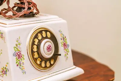 a close up of a clock with gold buttons at Vila Brinovka in Kostanjevica na Krasu