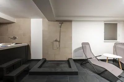 a bathroom with a sink and a shower at Villa DonLeone in Ponikva