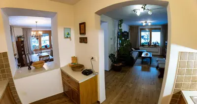 a kitchen and living room with an open floor plan at Apartma Lana in Mojstrana