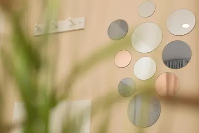 a wall with a bunch of circles on it at Cozy apartments in Ljubljana