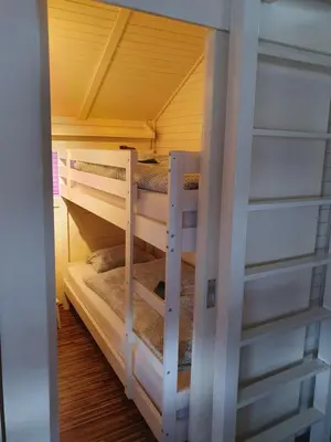a bunk bed room with two bunk beds at Spa Cottage Lavender in Terme Čatež in Čatež ob Savi