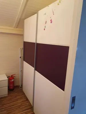 a wall in a room with brown and white at Spa Cottage Lavender in Terme Čatež in Čatež ob Savi