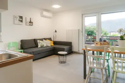 a living room with a couch and a table at Apartma BoLeRo in Tolmin