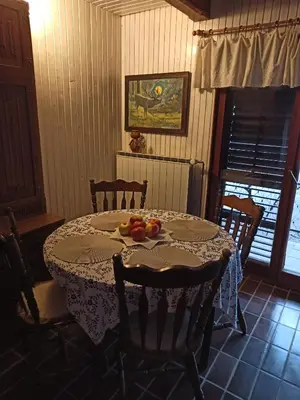 a table with fruit on it in a room at Serenity in Dramlje