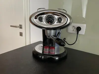 a coffee machine sitting on top of a counter at Apartmaji Kotnik in Kranjska Gora