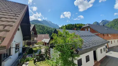 an overhead view of a town with buildings and a tree at Apartments Seventy Seven in Kranjska Gora