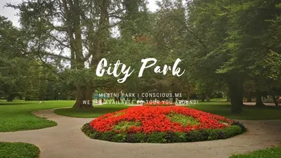 a sign that says city park with flowers in a park at Road View Apartment Celeia in Celje