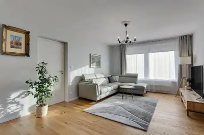 a living room with a couch and a table at Angel Boutique Home - Entire premium house in Laško