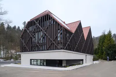 a large building with a brown and white at Hotel Čad in Ljubljana