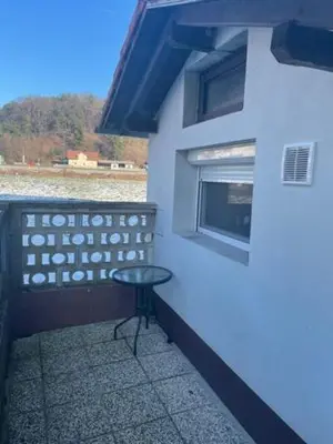 a small table sitting on the side of a building at Cute Spot in Ljubljana in Ljubljana