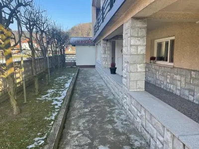 a walkway next to a house with water in it at Cute Spot in Ljubljana in Ljubljana