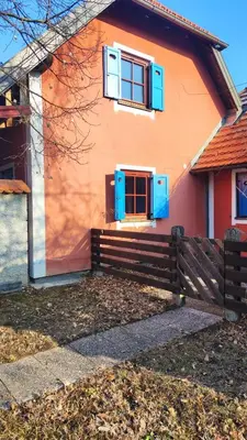 a house with a fence in front of it at DEMI108 - Terme čatež - pool tickets included in Čatež ob Savi