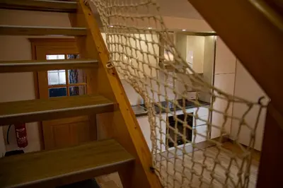 a spiral staircase in a room with a door at DEMI108 - Terme čatež - pool tickets included in Čatež ob Savi