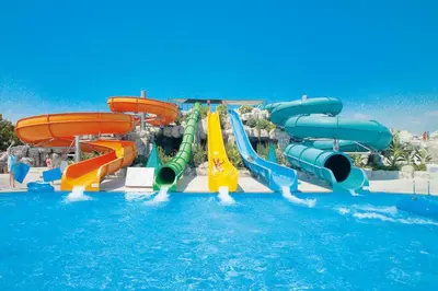 a water park with a water slide in the water at DEMI108 - Terme čatež - pool tickets included in Čatež ob Savi