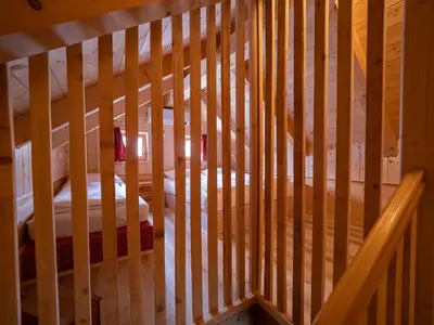 an overhead view of a wooden staircase in a house at Chalet Sejalec in Lesce