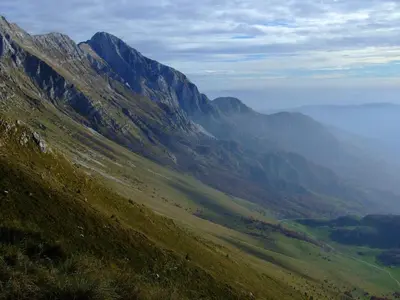 a view of a mountain with the ocean in the distance at Apartma Mataj in Kobarid