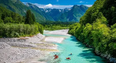 a group of people rafting down a river at Residence Soča in Soča