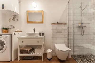 a bathroom with a sink and a toilet and a shower at Entire house in the center of Ljubljana - FREE PARKING - Dragon Garden Pavilion Ljubljana in Ljubljana