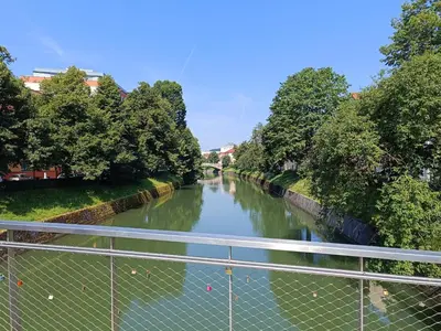 a view of a river from a bridge at Quiet Central in Ljubljana