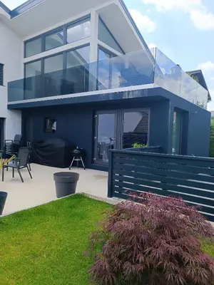 a house with a blue and white at Apartma FRIGO in Maribor