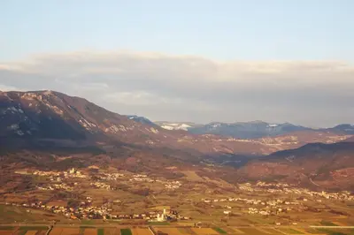 a view of a town in a valley with mountains at Apartma Uhanje pri Božičevih in Ajdovščina