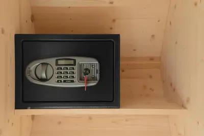 a microwave oven sitting on top of a shelf at Honeybee Hostel - Hiša kranjske čebele in Višnja Gora