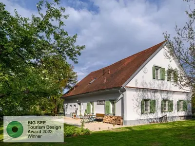 a white house with a red roof at House 1797 - Charm of Slovenian Vintage in Dob