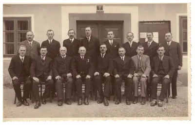 an old photo of a group of men in suits and ties at House 1797 - Charm of Slovenian Vintage in Dob