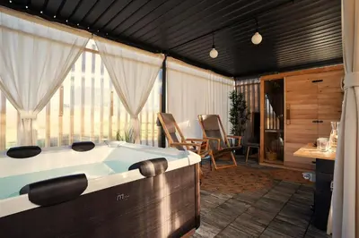 a room with a bath tub in a room at Glamping Happiness - Natural Pool & Wellness in Ribnica
