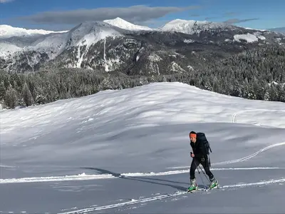 a person on skis in the snow on a mountain at Apartment Activity in Radomlje