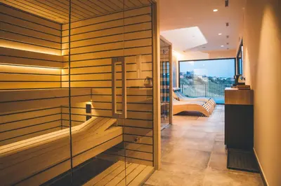 a room with a glass door with a view of a balcony at Villa Vajta in Dobrovo