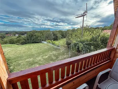 a balcony with a view of a yard at APARTMA-SPA NATURA in Sveti Jurij ob Ščavnici