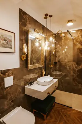 a bathroom with a sink and a toilet at Bresidence Apartments with free private parking in Ljubljana