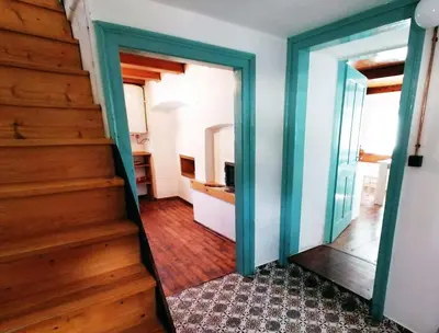 a view from the hallway of a house with stairs at počitniška hiška MEDVEJKE in Slappe dʼIdria