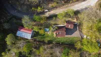 an aerial view of a house and a road at Hiška pod Rudnico 2 in Podčetrtek