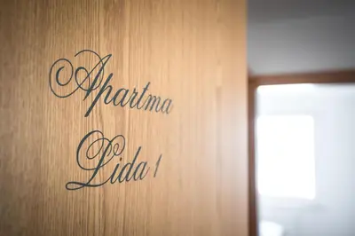 a sign on a wall that says vitaminahoahoahoahoahoahoahoaho at Apartma Lida 1- mirna lokacija, brezplačno parkirišče, 10 minut hoje do jezera in gradu in Bled