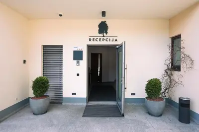 an entrance to a building with an open door at B&B Pod vrbo in Ljubljana